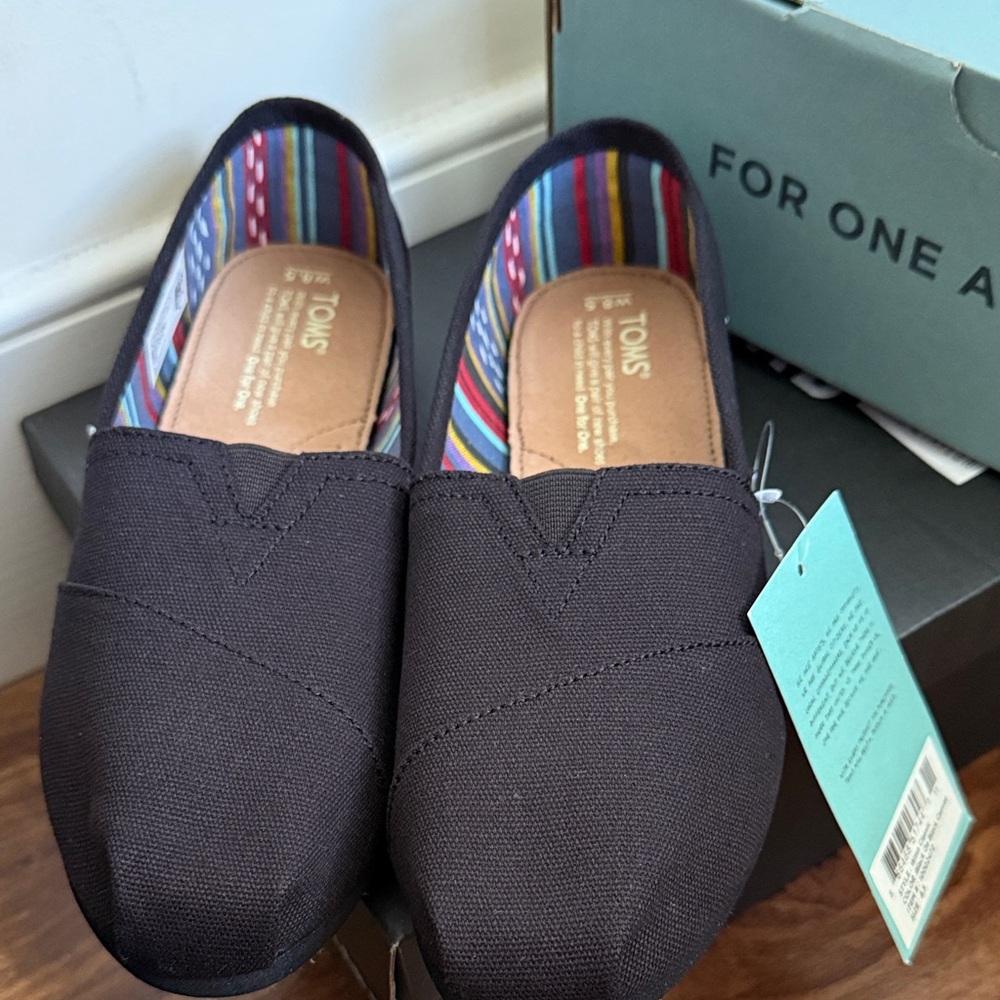 TOMS Men's Black Canvas Slip-Ons